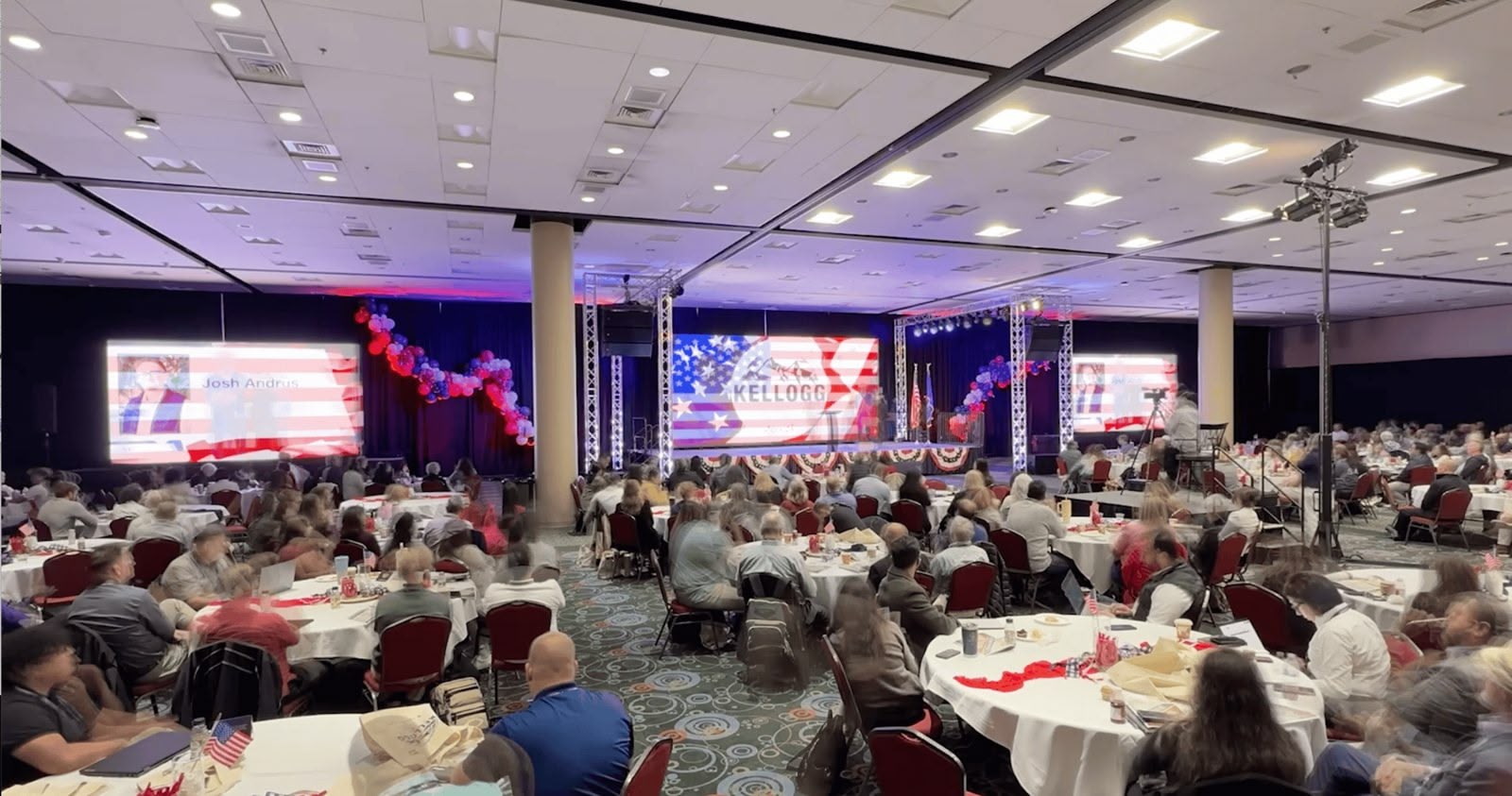 Agents seated across the ballroom during a general session