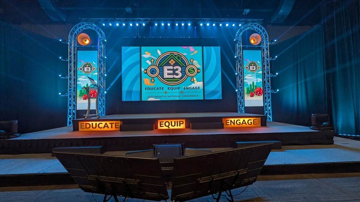 E3 Educate Equip Engage stage, front view with truss archways and confidence monitor