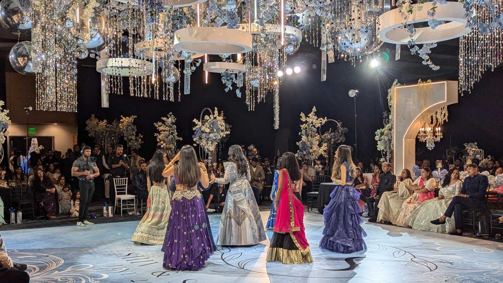 A cultural dance performance on the reception floor